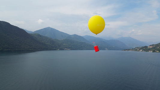 Bazza Superleggera flying over lake orta